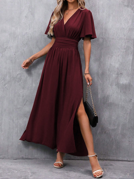 Eterna | Vestido Largo Elegante en Negro con Escote en V Manga Transparente y Abertura